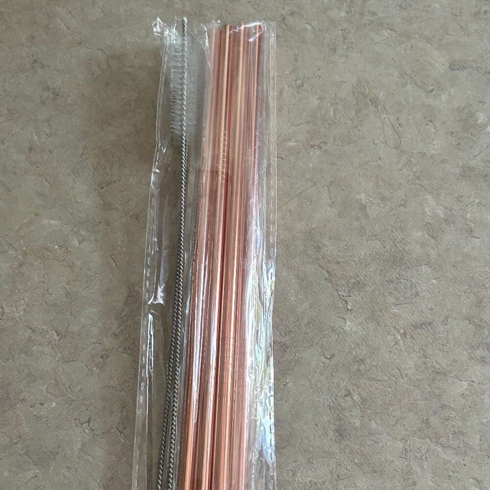 Rose gold metal straws with brushes